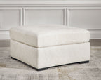 Ivory oversized accent ottoman, wide cushioned top and sturdy block legs