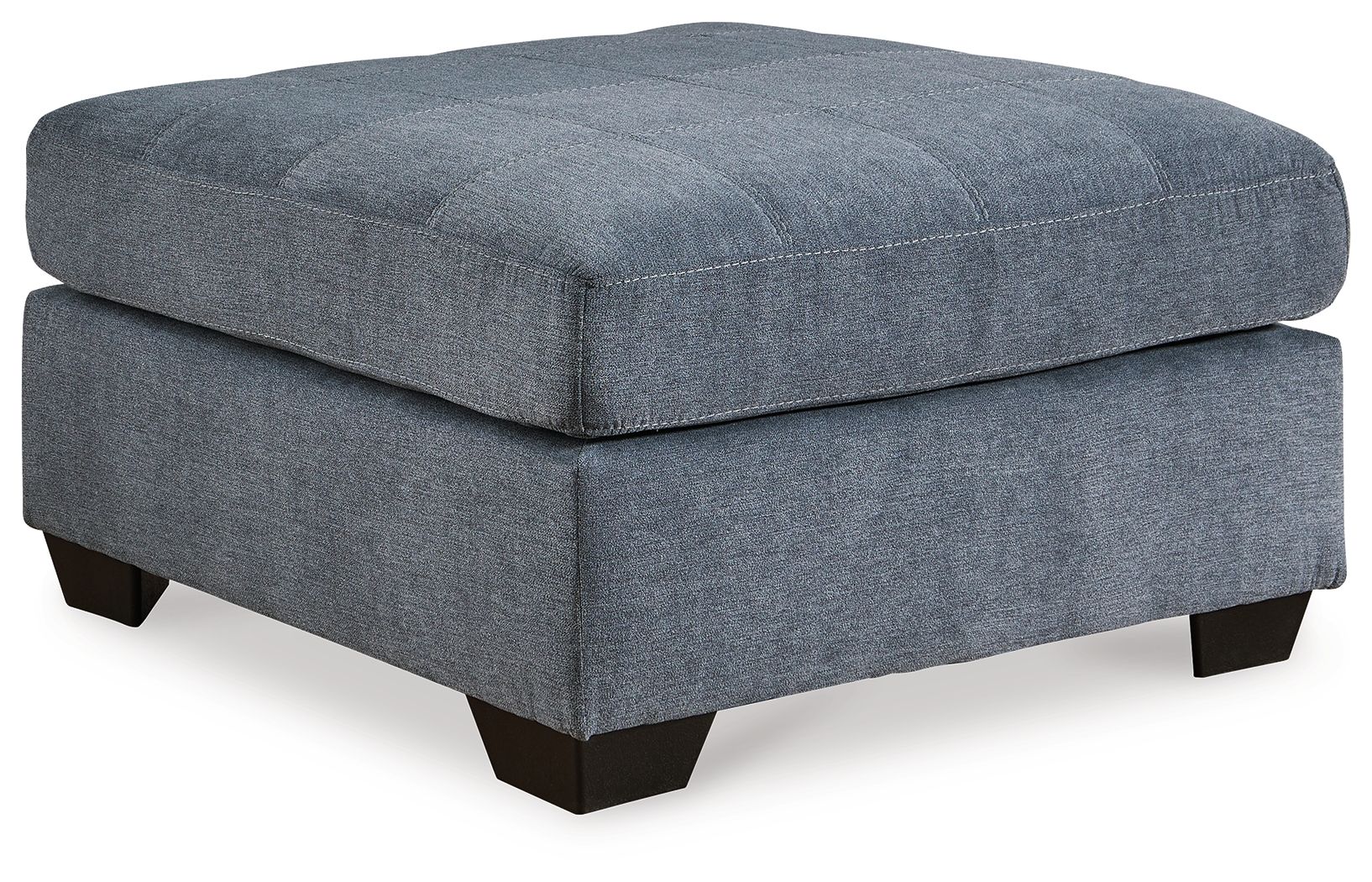 Oversized accent ottoman in dark gray upholstered fabric with square tufted top