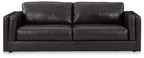 Dark leather sofa with two seat cushions and rolled arms
