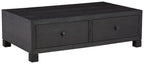 Dark wood cocktail table with storage drawers, two front drawers and square legs